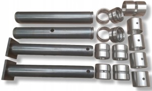 SWORZNIE + TULEJE ŁYŻKA TEREX TLB 740 840 890 990 TYŁ